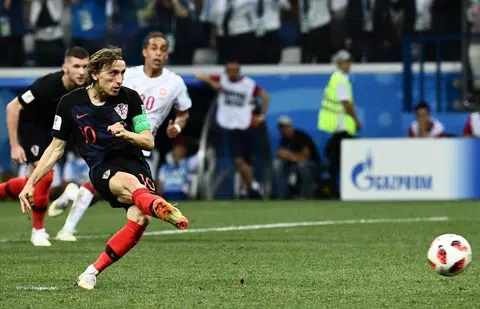 Modric finds penalty redemption as Croatia pip Denmark