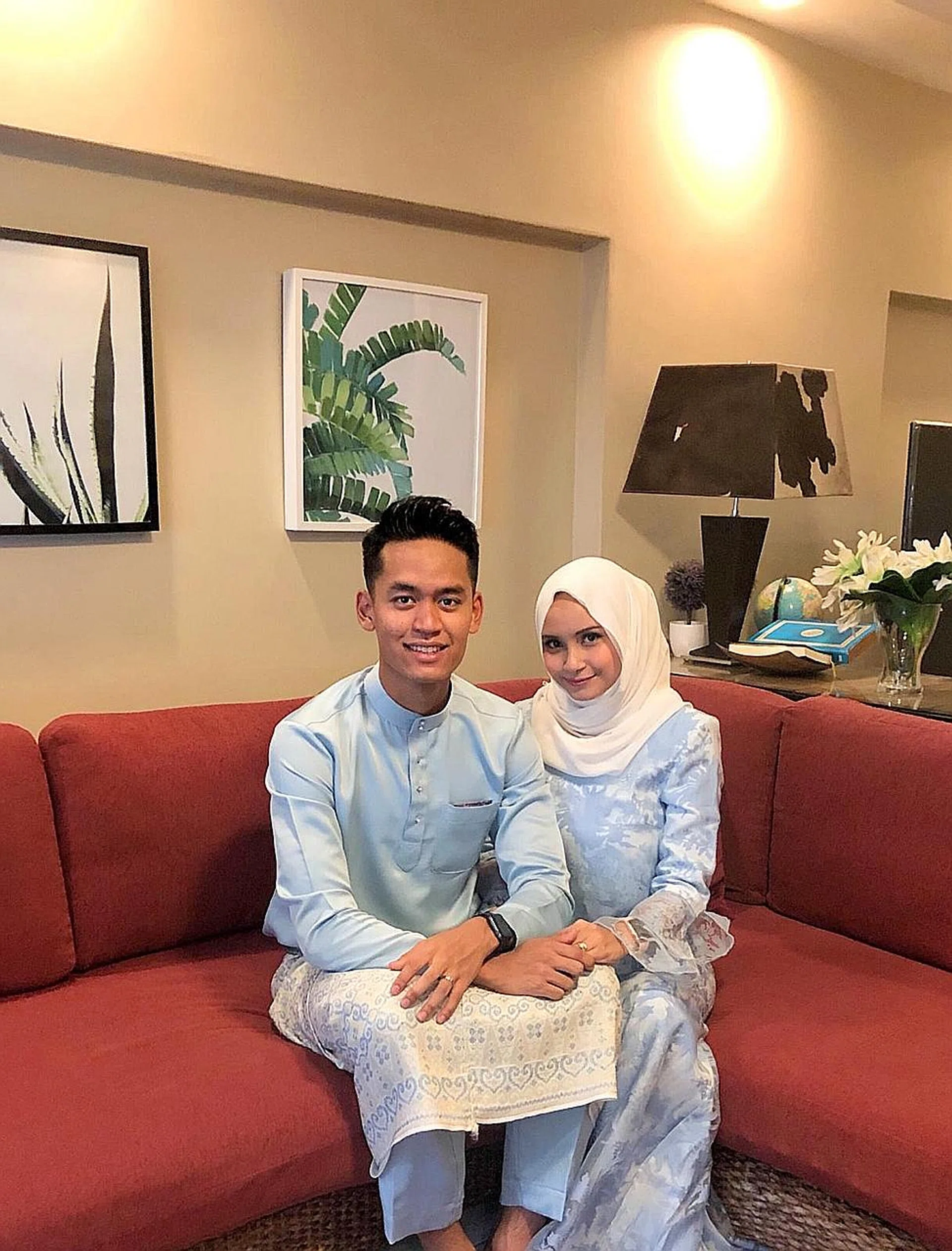 Tampines Rovers defender Amirul Adli celebrating Hari Raya with his wife Nur Darina Kamal. 