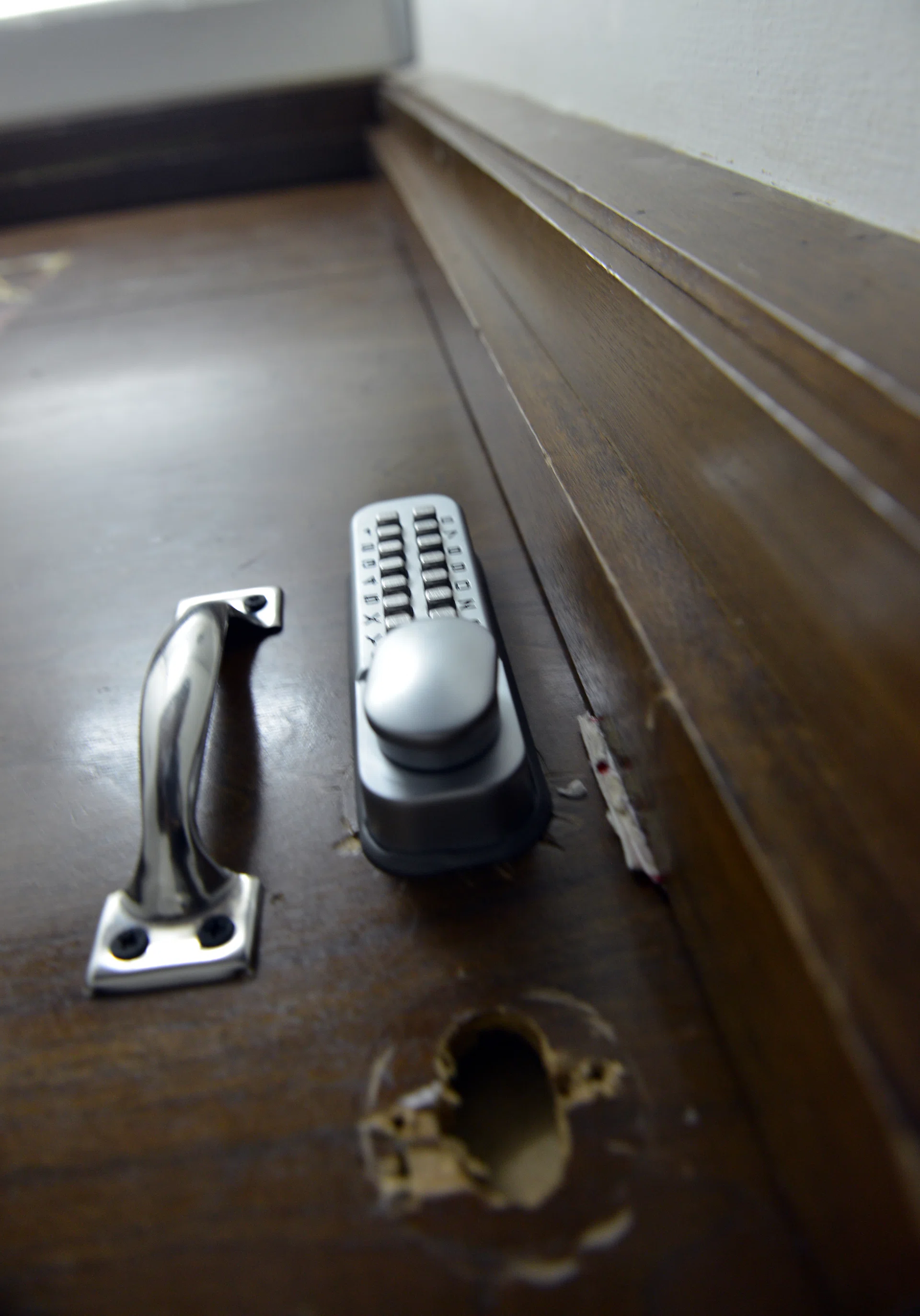 PLANNED: Lim Hui Yin waited and asked a tenant for the PIN code to this lock (above) to enter the premises. He then managed to break into Ms Yap Jing Ting’s room on the second storey 
