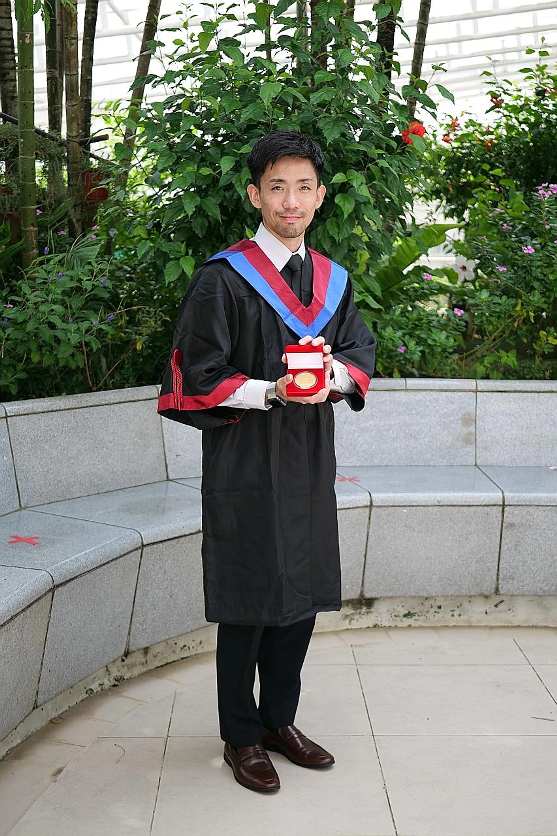 (Aboive) Mr Stanley Ong and Mr Norheesham Rahmat both graduated from ITE yesterday. 