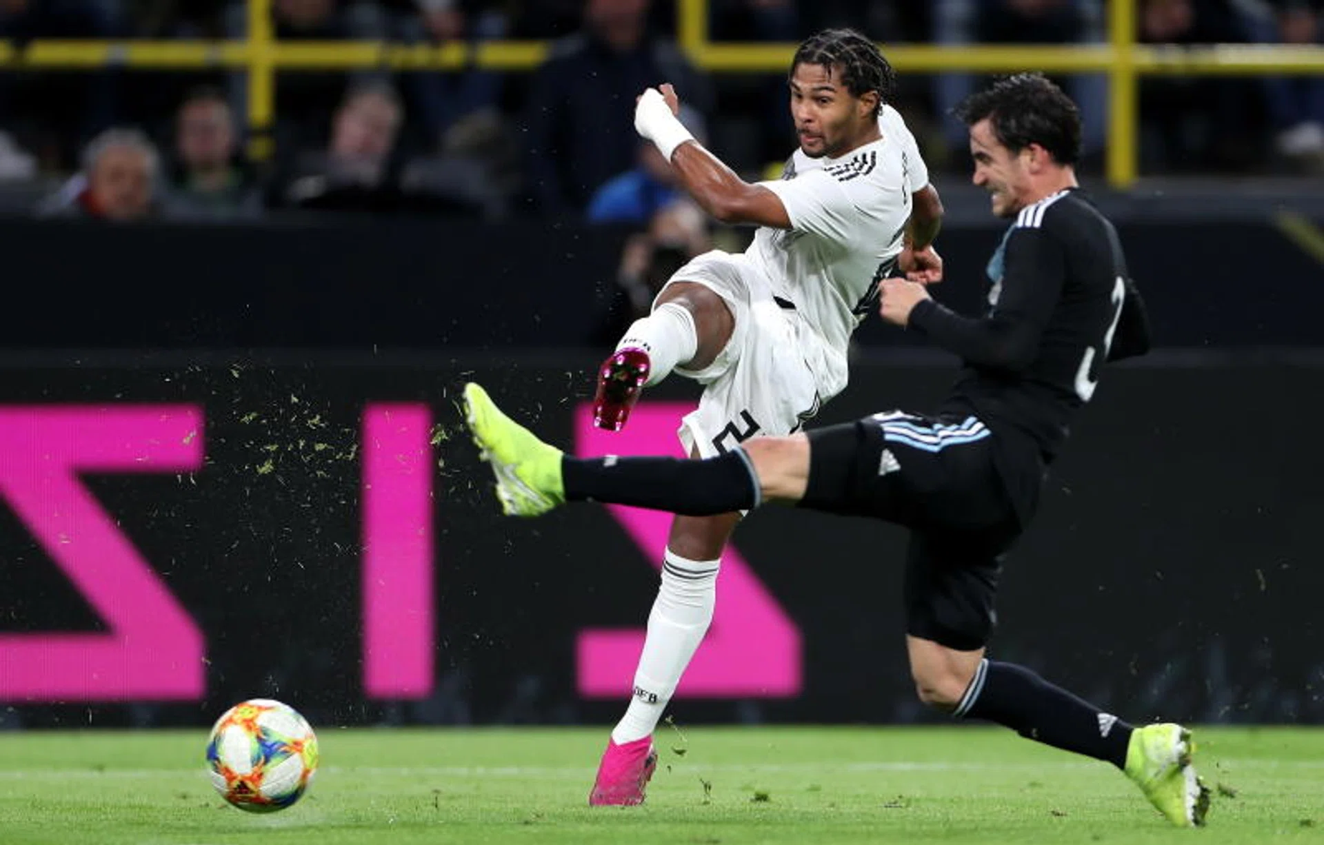 Germany's Serge Gnabry in action against Argentina's Nicolas Tagliafico. 