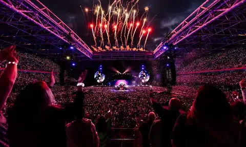 Coldplay heats up concert tourism mania