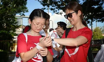 LED wristbands recycled for the first time in history of NDP shows