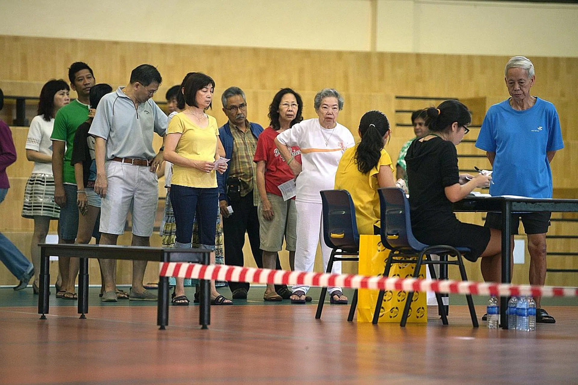 Measures such as temperature taking, the use of disposable gloves and hand sanitising took up time, and the 1m safe distancing rule lengthened queues.