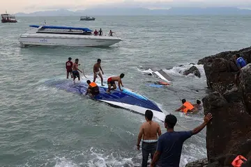 Huge wave flips speedboat