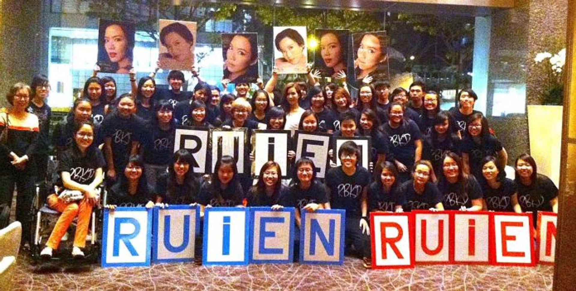 SUPPORT: Rui En (above, in white) with the members of her fan club, RBKD, at the Star Awards 2014.