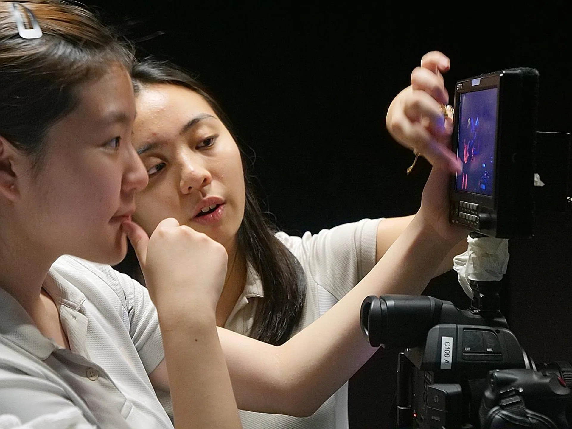 (Above, in background) Miss Ashley Jane Leow Shiyi directing Jazz After Nine.