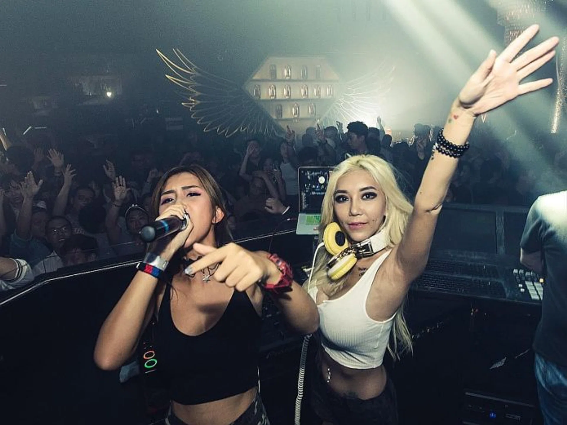 AT WORK: Leng Yein (with blonde hair) and Leng Sean were in Singapore over the weekend and performed at FashionTV Club's Pitstop Party (above). 