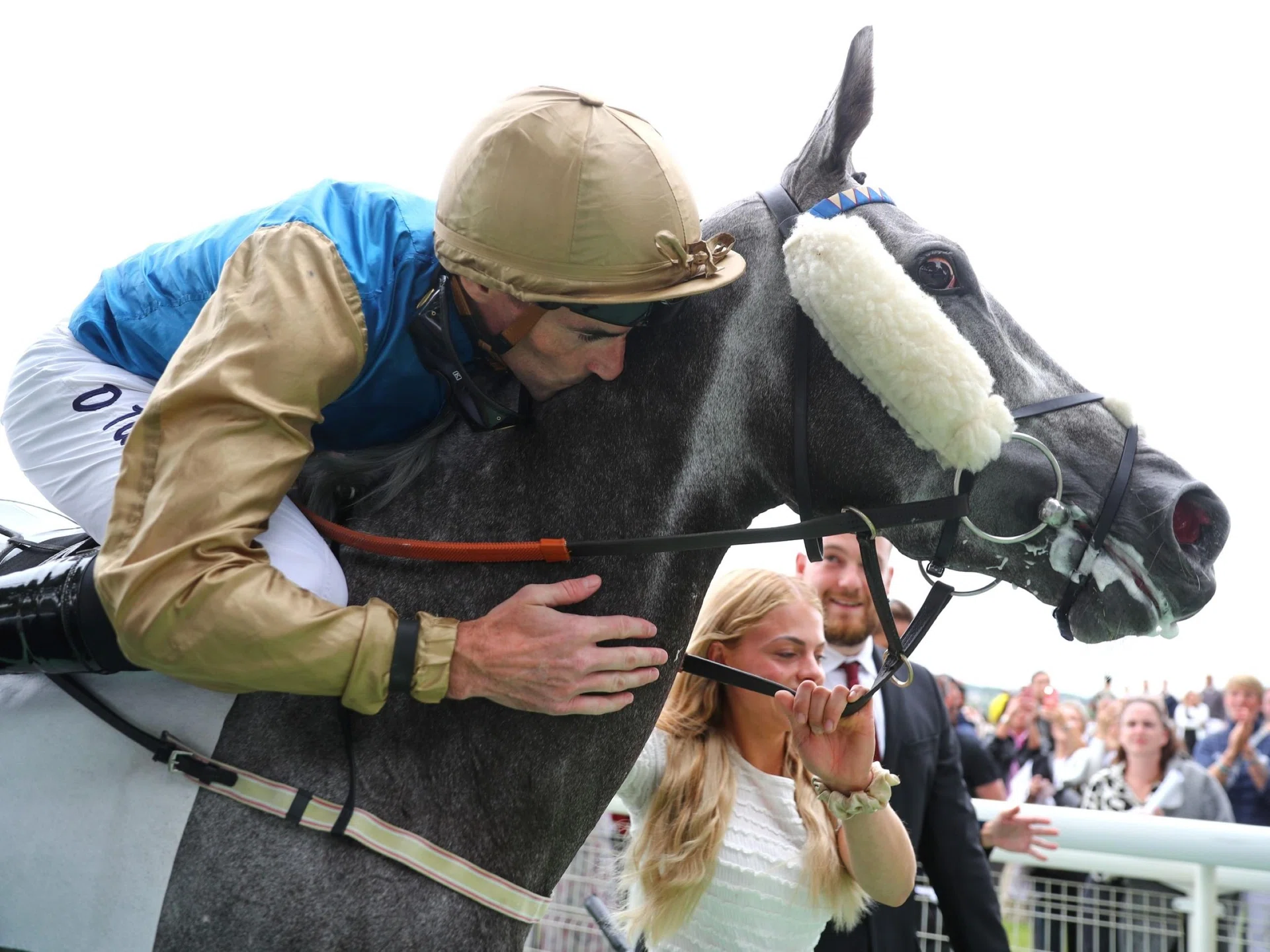 Jockey Daniel Tudhope giving Fallen Angel a pat and a kiss on her neck after the filly claimed the Group 1 Prix Rothschild (1,600m) at Deauville on Aug 3. 
