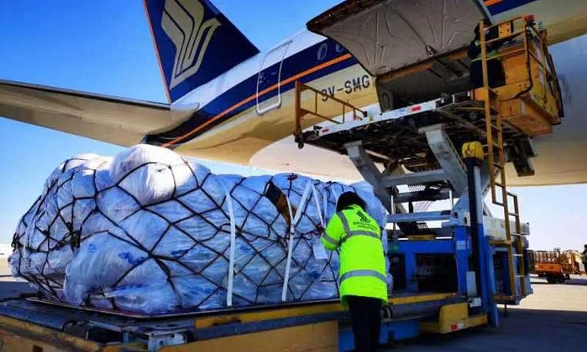 The first batch of 48 tents being loaded into the cargo hold of an SIA plane bound for Singapore before transiting to Istanbul.