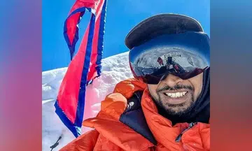 Search and rescue team unable to find missing Singaporean Everest climber, says wife
