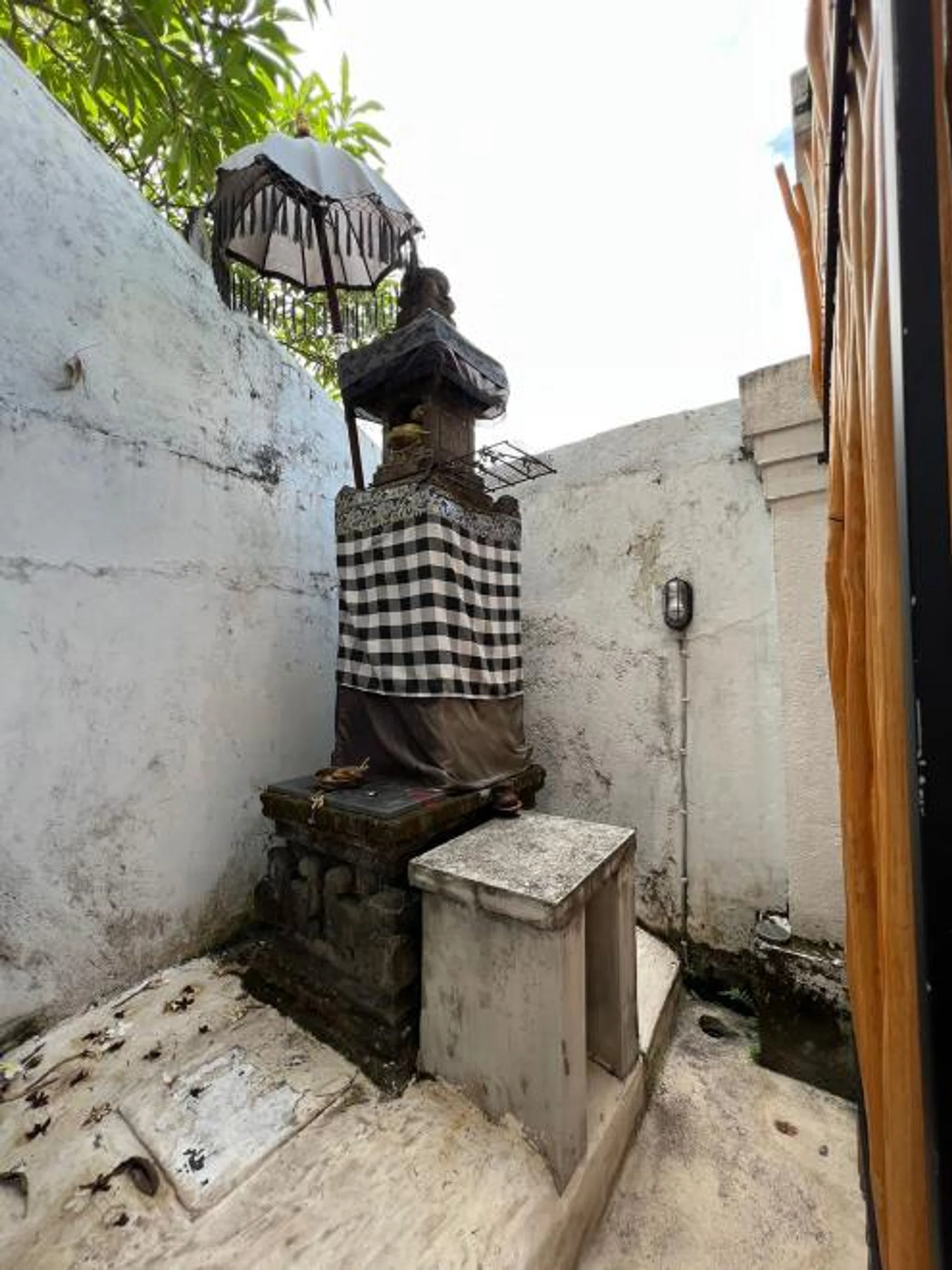 Mr Redha Indra claimed the thief had climbed onto the wall surrounding the villa and landed on a stone structure in front of it before entering the villa through the sliding doors. 