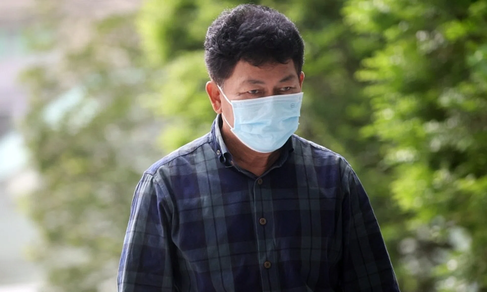 Mohd Razif Radi arriving at the State Courts on Oct 10. He is accused of teaching a doctrine contrary to Islamic laws.