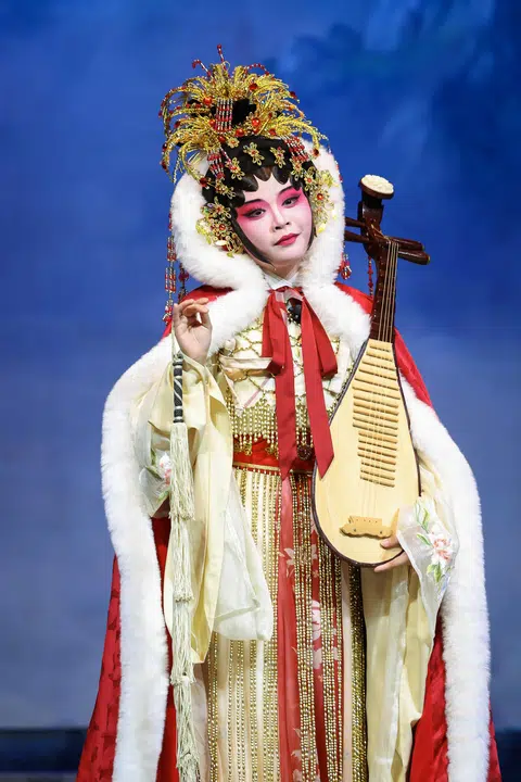 Ms Jade Wong, 23, a marketing undergraduate, performs opera with Cantonese clan Kong Chow Wui Koon.