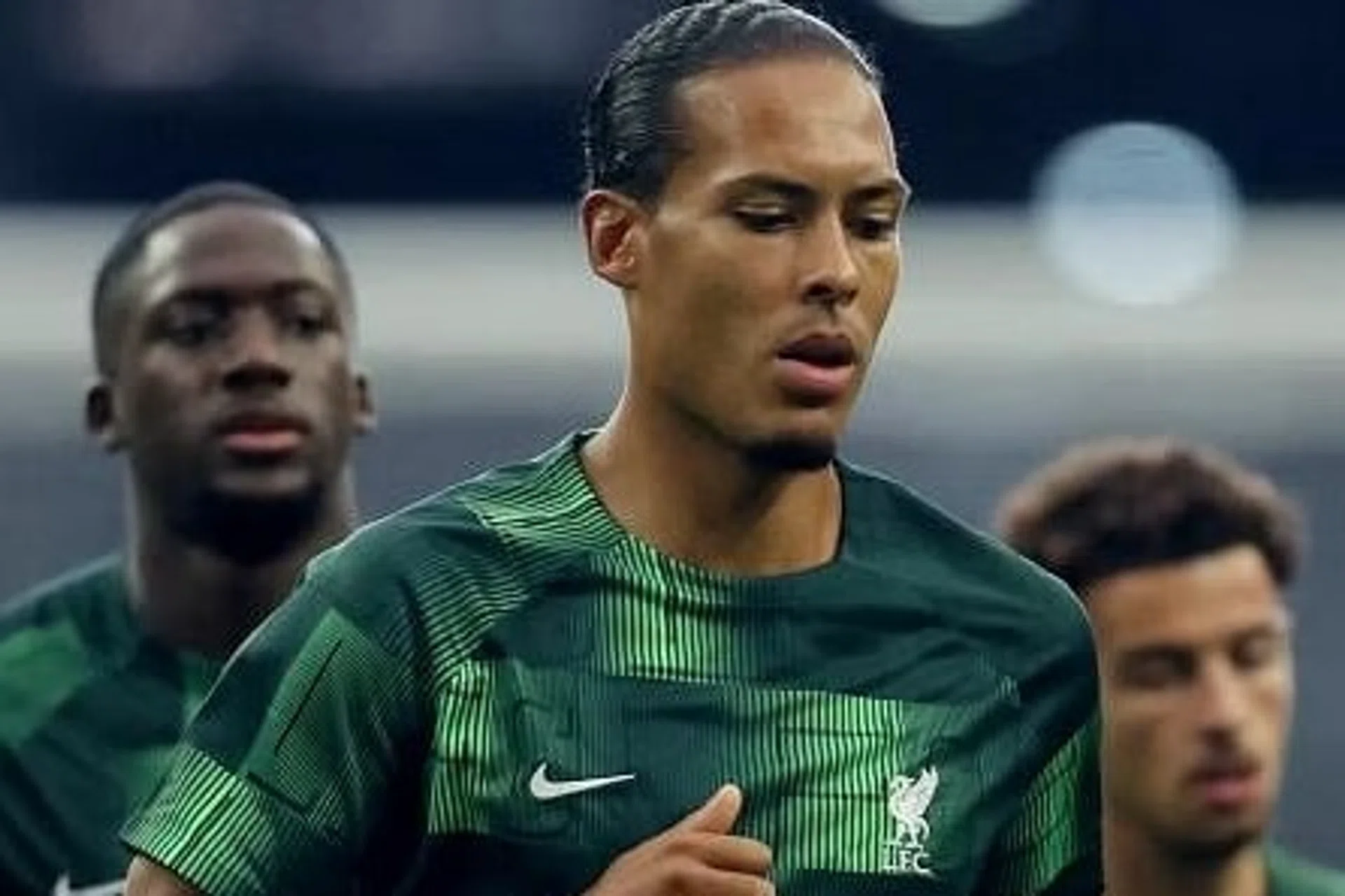 Liverpool's Virgil van Dijk (centre) during the warm-up before the match against Leicester in Singapore.