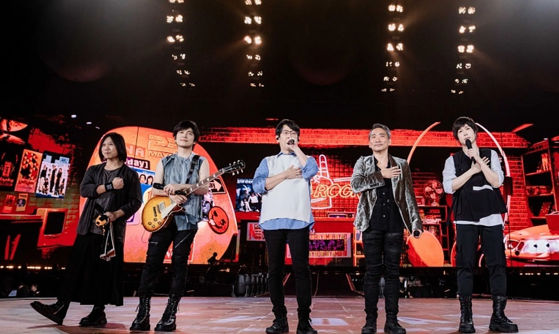 Taiwanese rock band Mayday, comprising (from left) bassist Masa, guitarist Monster, drummer Guan You, guitarist Stone and lead vocalist Ashin, at a concert at the Shanghai Stadium in China on Nov 15.