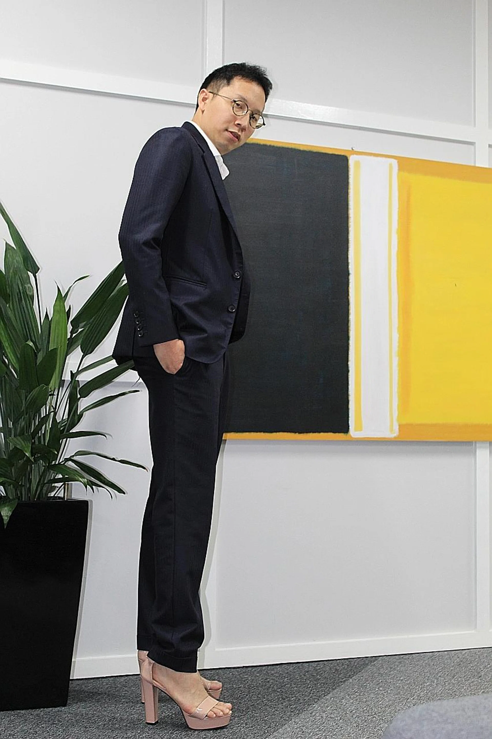 Mr Christopher Huang, managing director of CHP Law, will make the 1.7km walk from Republic Plaza to 11 Empress Place in five-inch heels. It will be his first time wearing heels. 