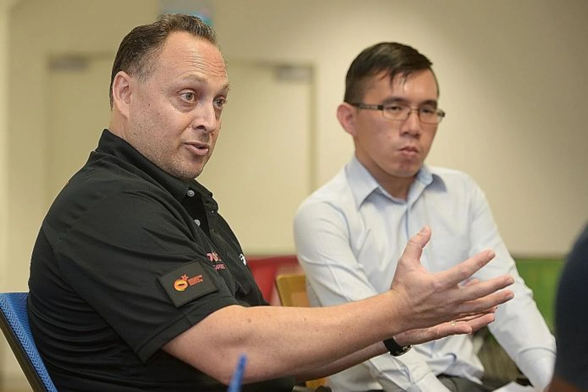ON HIS WISH LIST: SFA interim president Kenneth Ho (above, in white) is hoping that the SFA retains the position of general manager after Todd Vladich's (in black) stint ends.