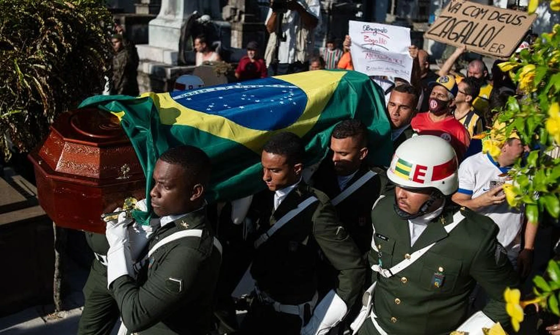 Officers of the Military Police carry the coffin of Brazilian football legend Mario Zagallo during his burial in Rio de Janeiro on Jan 7, 2024.