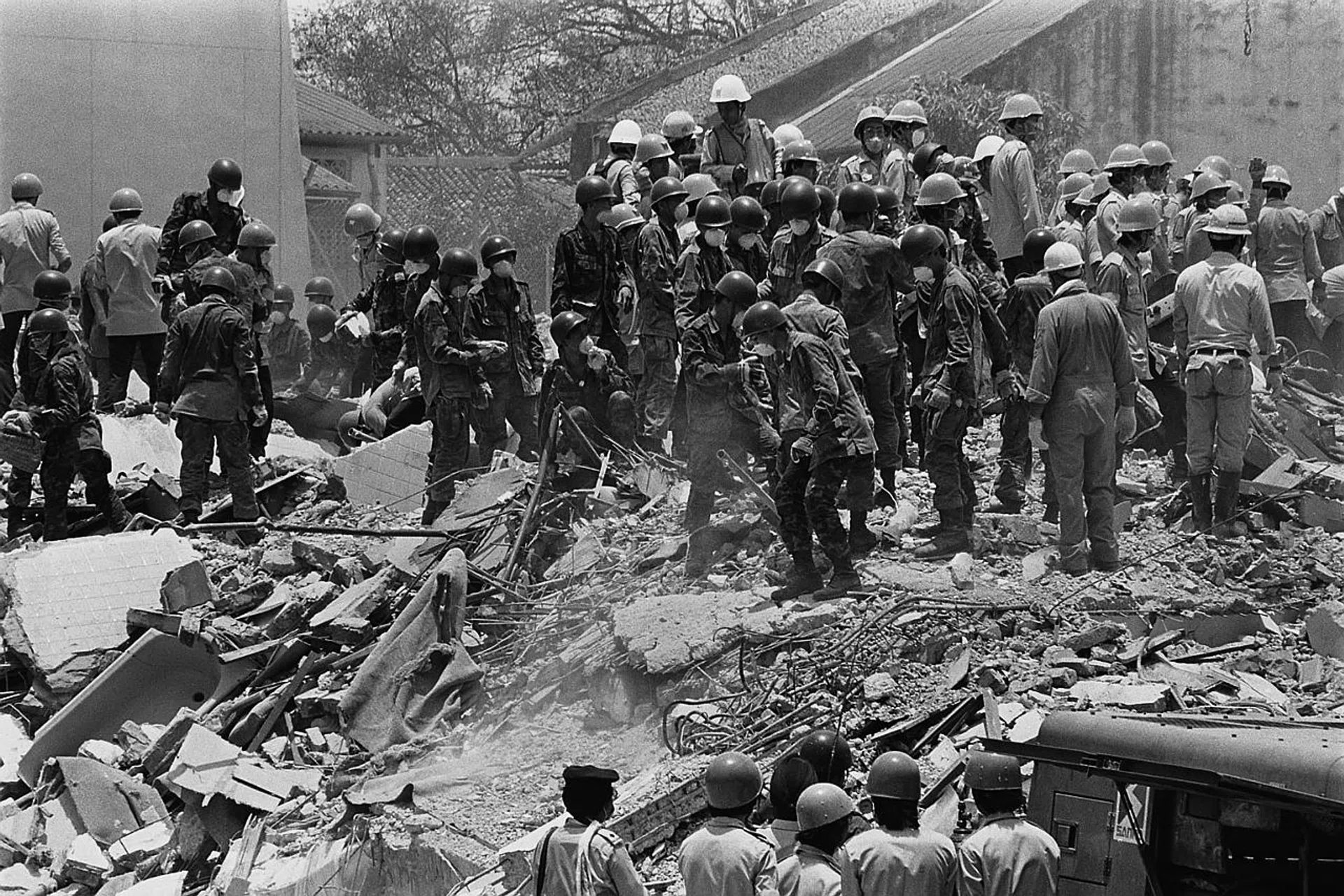 Rescue workers at the site of the collapsed Hotel New World on March 19. 