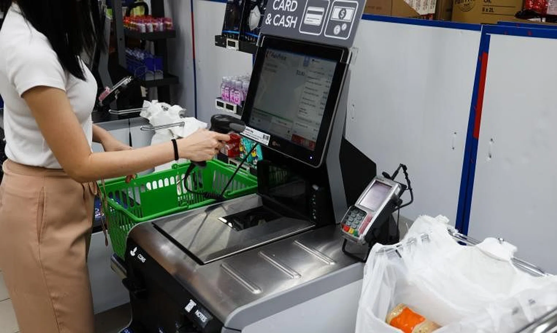 There are no plans to add more staff at self-checkout counters to ensure that customers scan the barcode for plastic bags.
