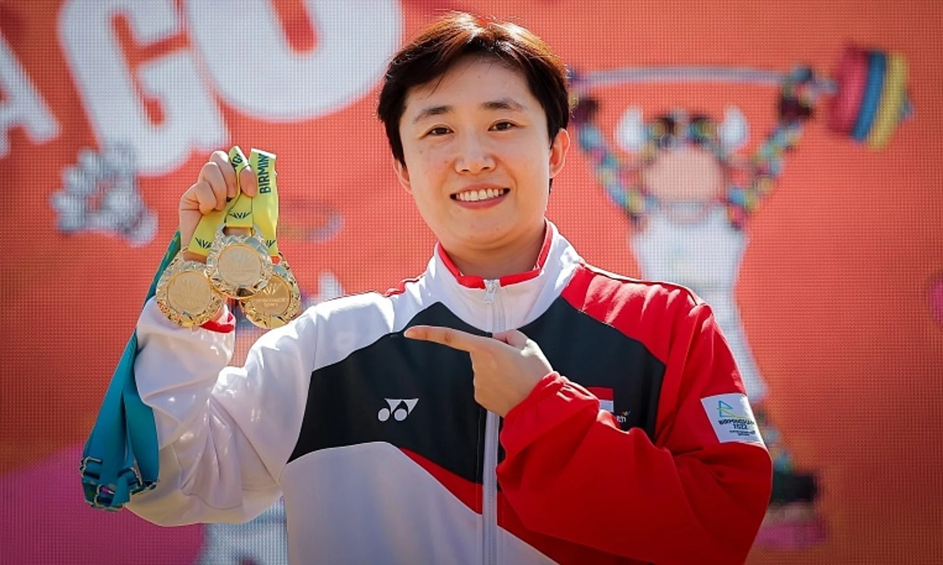 Singapore table tennis player Feng Tianwei with her medals at the Birmingham Commonwealth Games in 2022.