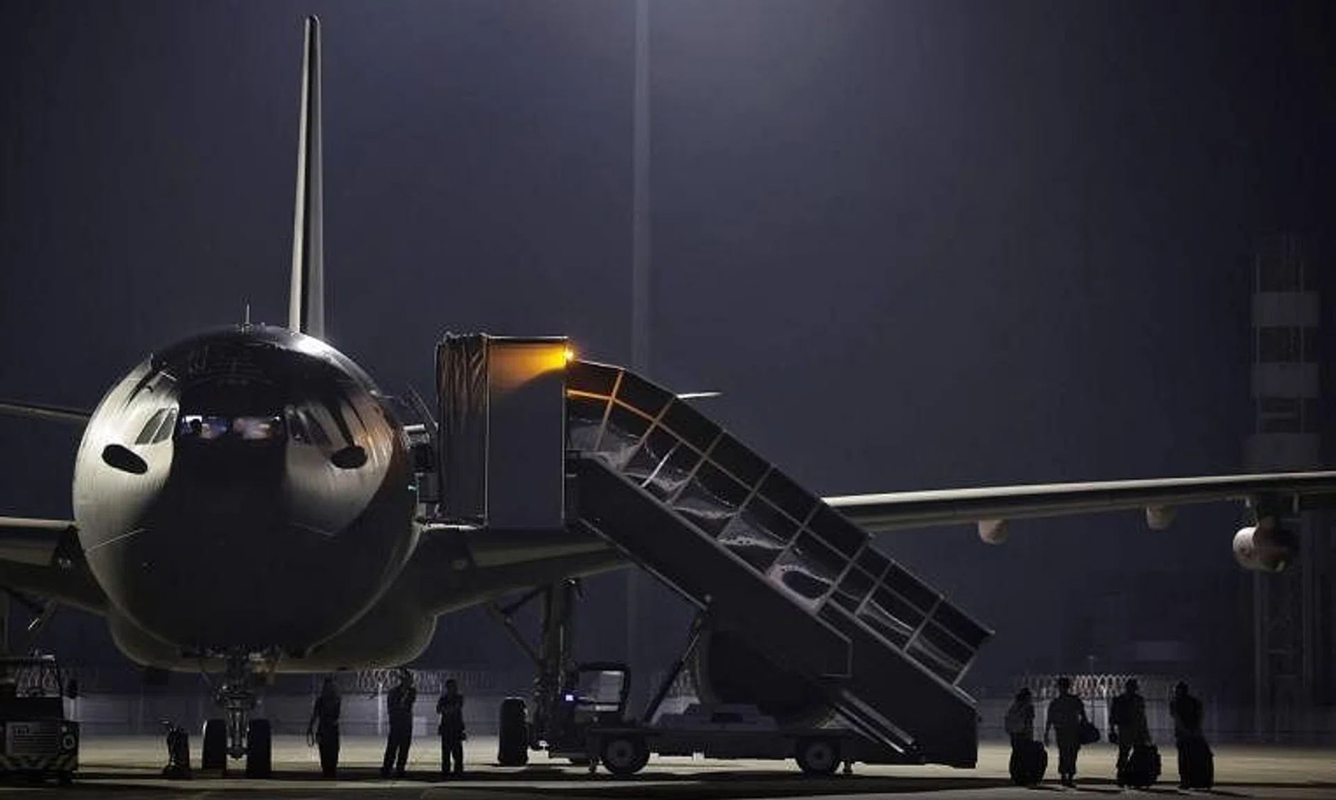 Some of the 69 SAF personnel deployed seen boarding the A330 Multi-Role Tanker Transport (MRTT) aircraft at Changi Air Base (East) on March 15, 2024. 