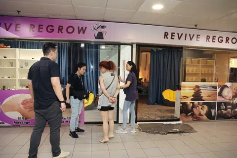 Woman arrested in raid on Chinatown massage parlour