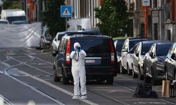 Shaken Swedes start heading home after two fans shot dead in Brussels