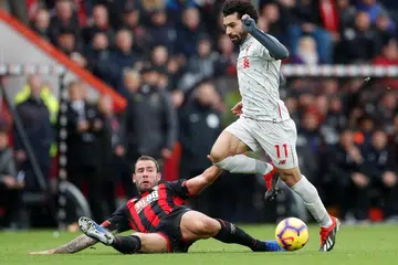 Sizzling Salah scores hat-trick to send Liverpool top