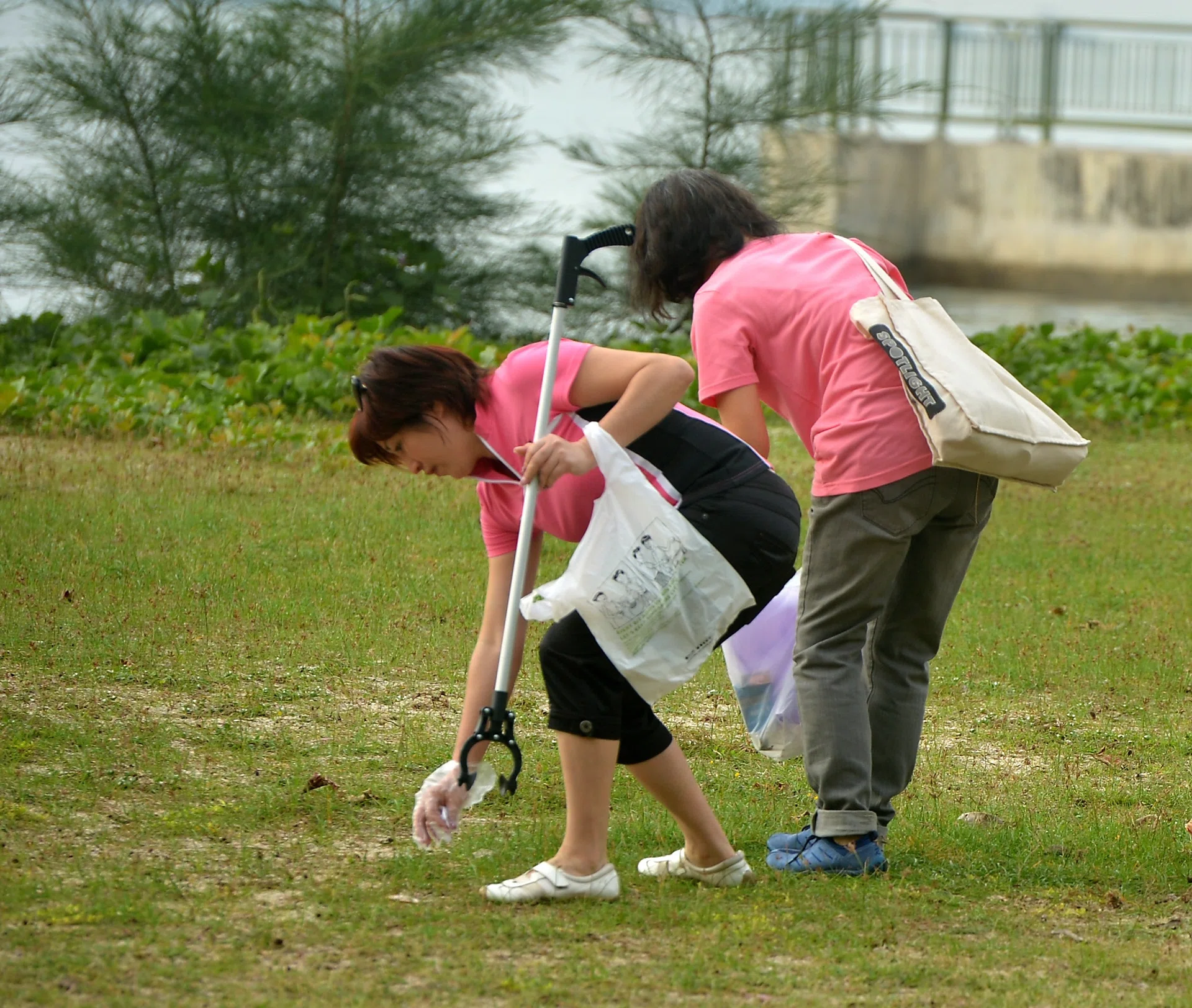 CONTRIBUTING: Volunteers picking up litter at East Coast Park.
