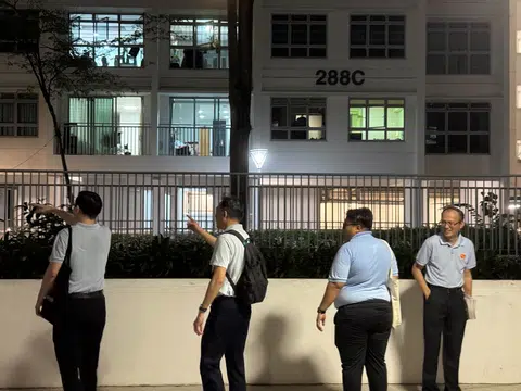 A team of Workers' Party members and volunteers seen at the public housing blocks at Punggol Place, which is under Pasir Ris-Punggol GRC, on Feb 25, 2025.