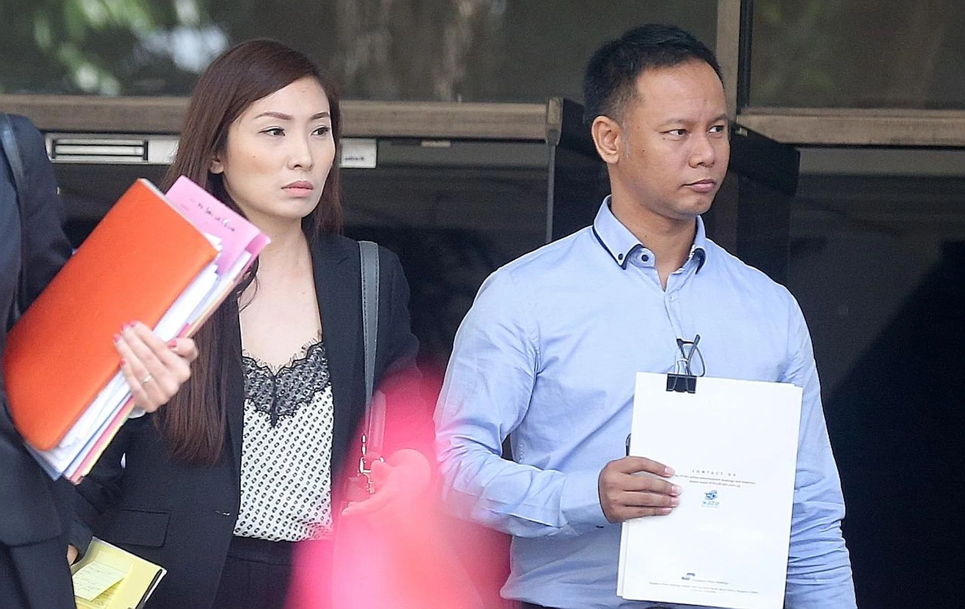 Linda Seah Lei Sie with her husband Lim Toon Leng. They are accused of abusing their domestic helper Phyu Phyu Mar. 