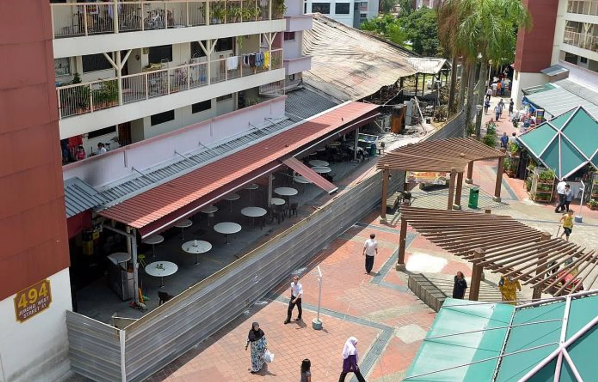 AT A LOSS: What's left of the wet market and coffee shops at Block 493 and Block 494 in Jurong West Street 41. 