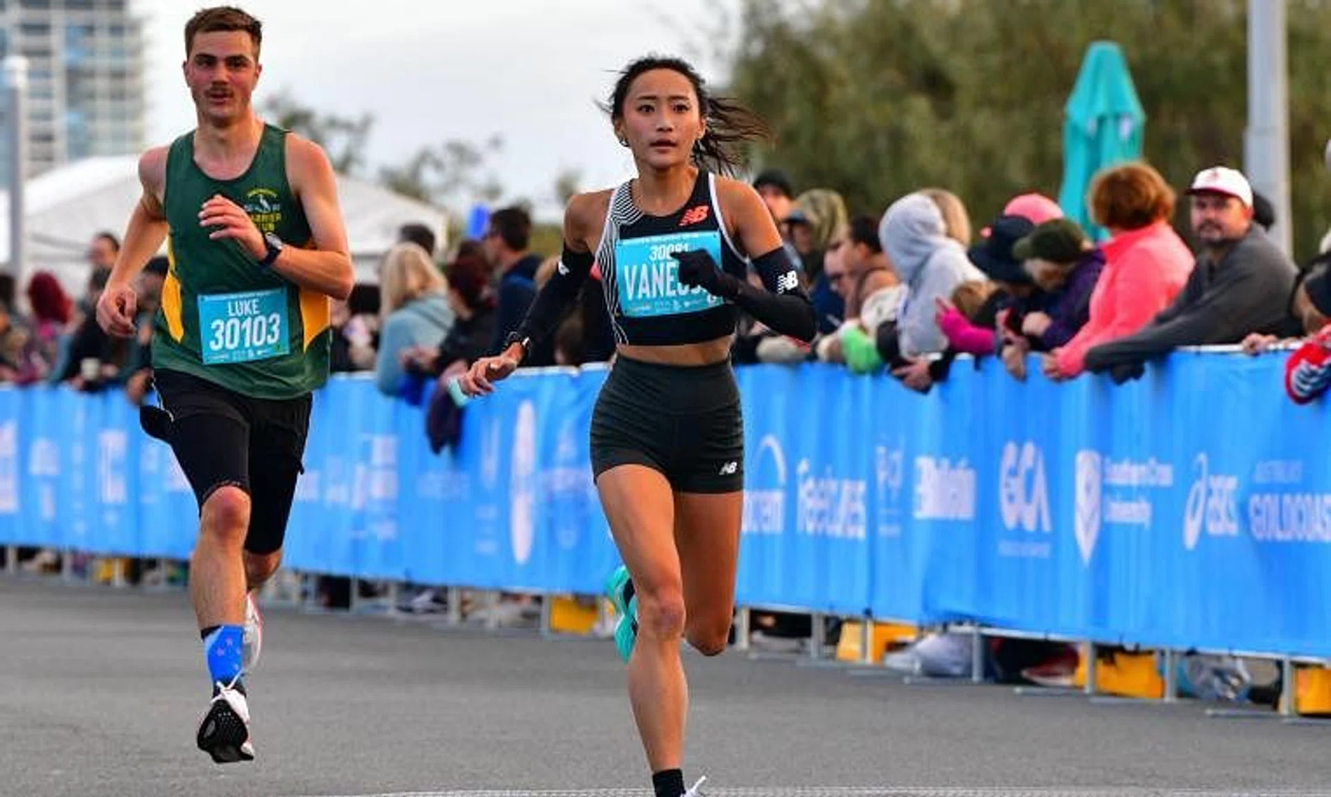 Vanessa Lee (right) set a 10km (road) national record after clocking 35min 55sec at the Gold Coast Marathon.