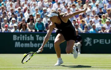 Wozniacki rallies to defeat Kerber, reach final