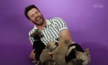 Watch out, video of Chris Evans and puppies ahead
