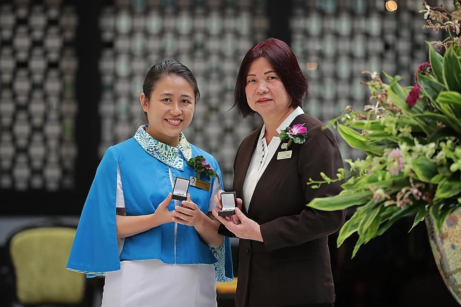 (From left) Ms Koh Pei Pei and Ms Tan Mui Eng were among the nurses honoured yesterday. 