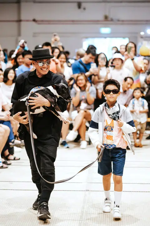 Daniel Boey and his rescue dog Luna modelling his label Furry Tales in a fashion show at Pasar Pink in end-May.