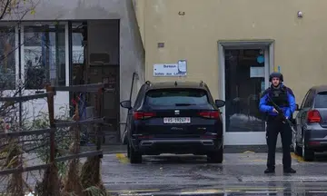 Swiss police on manhunt for shooter who killed two
