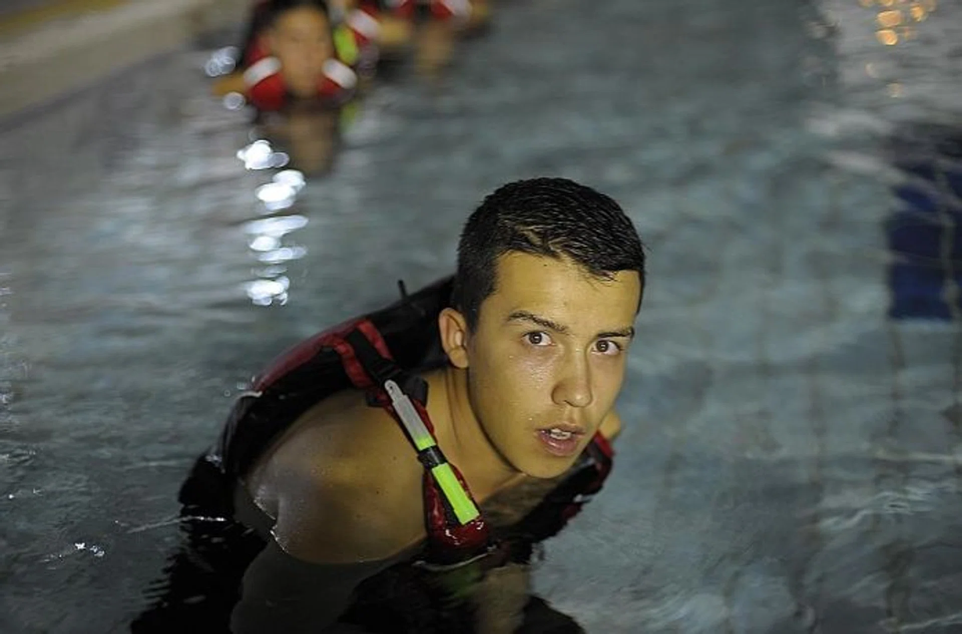 EXCELLING:  Mr Aneirin Flynn going through national service training in the Naval Diving Unit. 