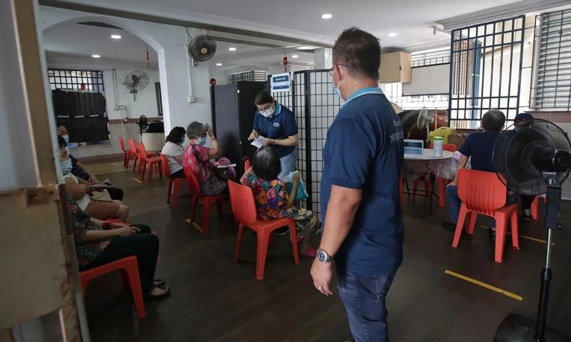 Residents queue at a voluntary tuberculosis screening station at Block 3 Jalan Bukit Merah, on May 27, 2022.