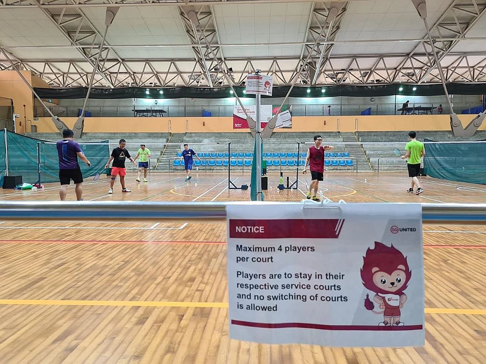 Badminton players at Yishun Sports Hall. Sport Singapore said yesterday that safe management measures, including the one banning the inter-mixing of groups, are clearly spelt out in its advisory and at its facilities. 