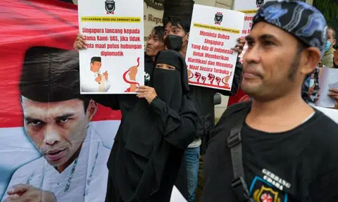 Supporters of preacher denied entry to Singapore stage protests in Indonesia