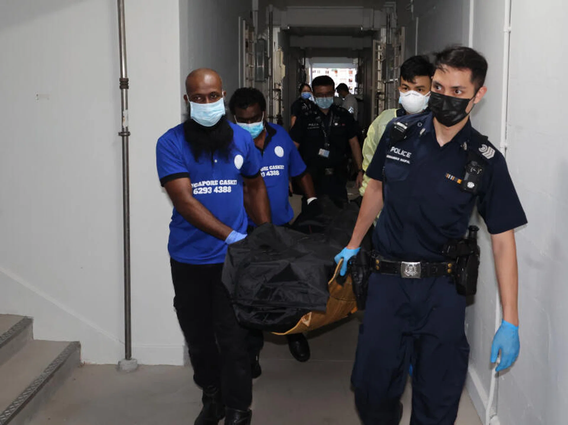 A 69-year-old woman was found lying motionless in a unit at Block 100 Aljunied Crescent on Jan 8, 2023.