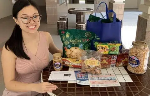 Nurse hands out Hari Raya carepacks paid out of own pocket