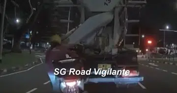 Motorcyclist's close call with runaway truck caught on video