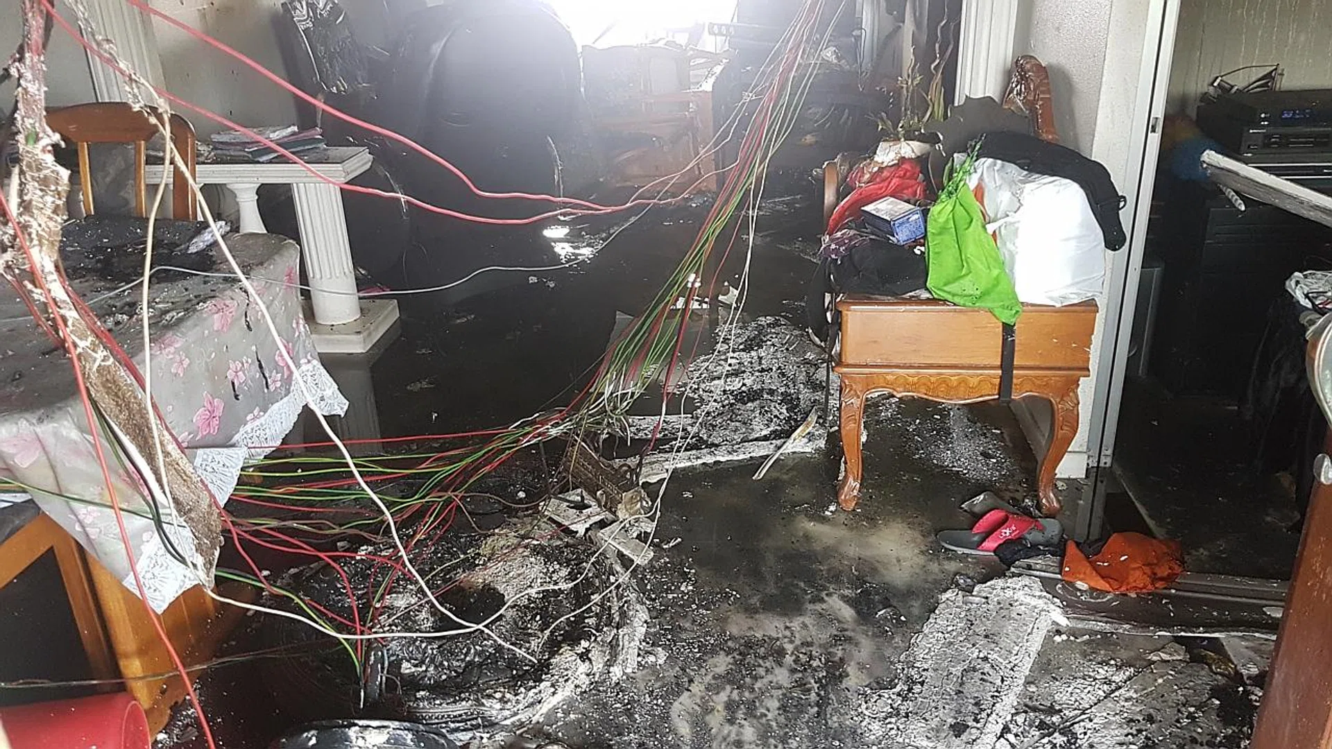 The aftermath of the blaze in the five-room flat. 