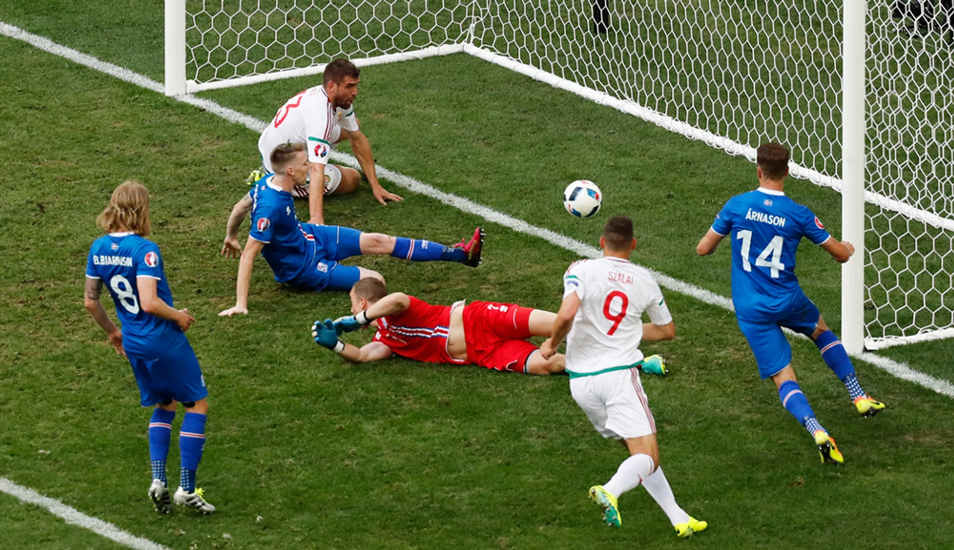 Iceland's Birkir Saevarsson scores an own goal and Hungary's first 