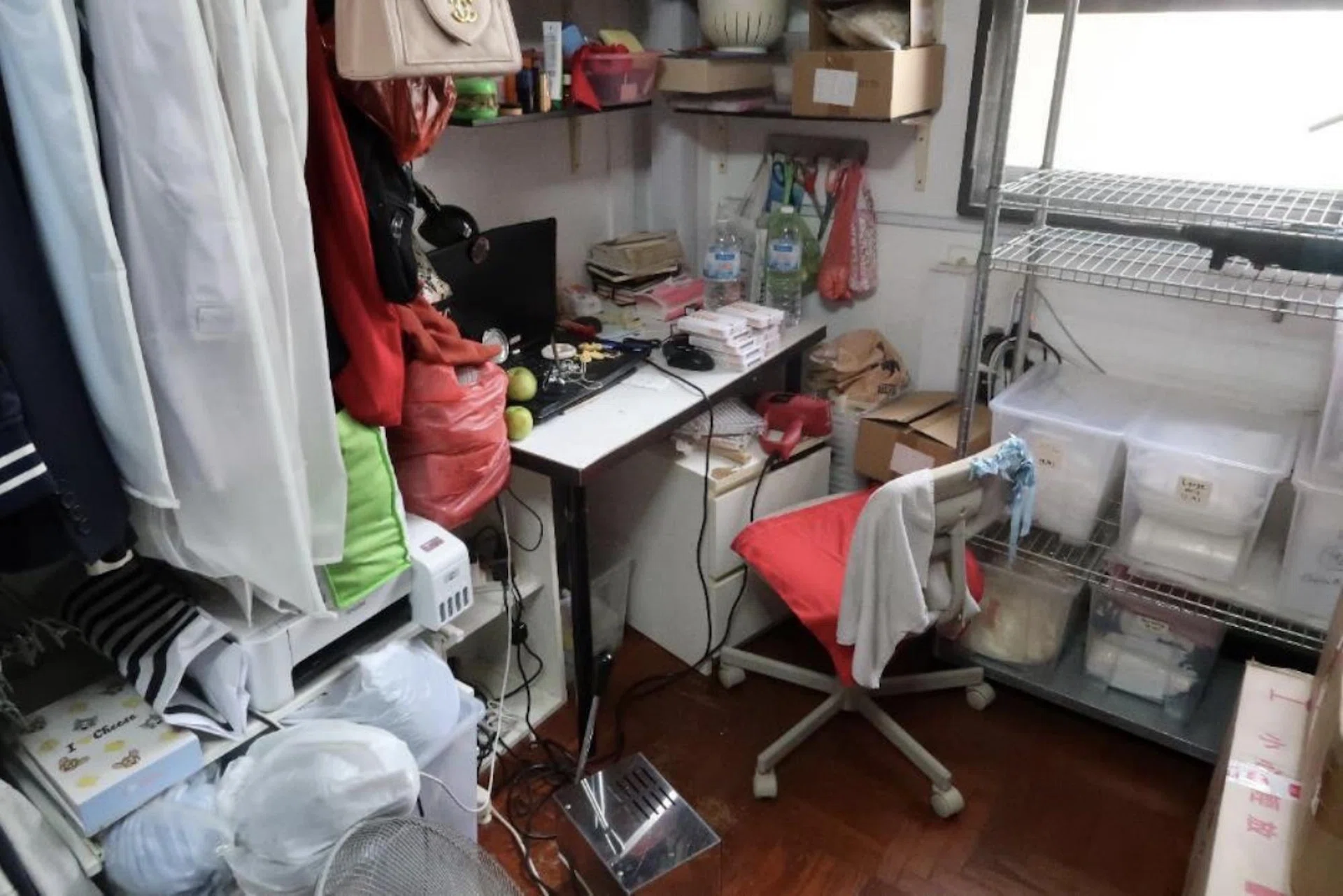 An HDB flat used for illegal manufacturing and storing health products and e-vaporisers.